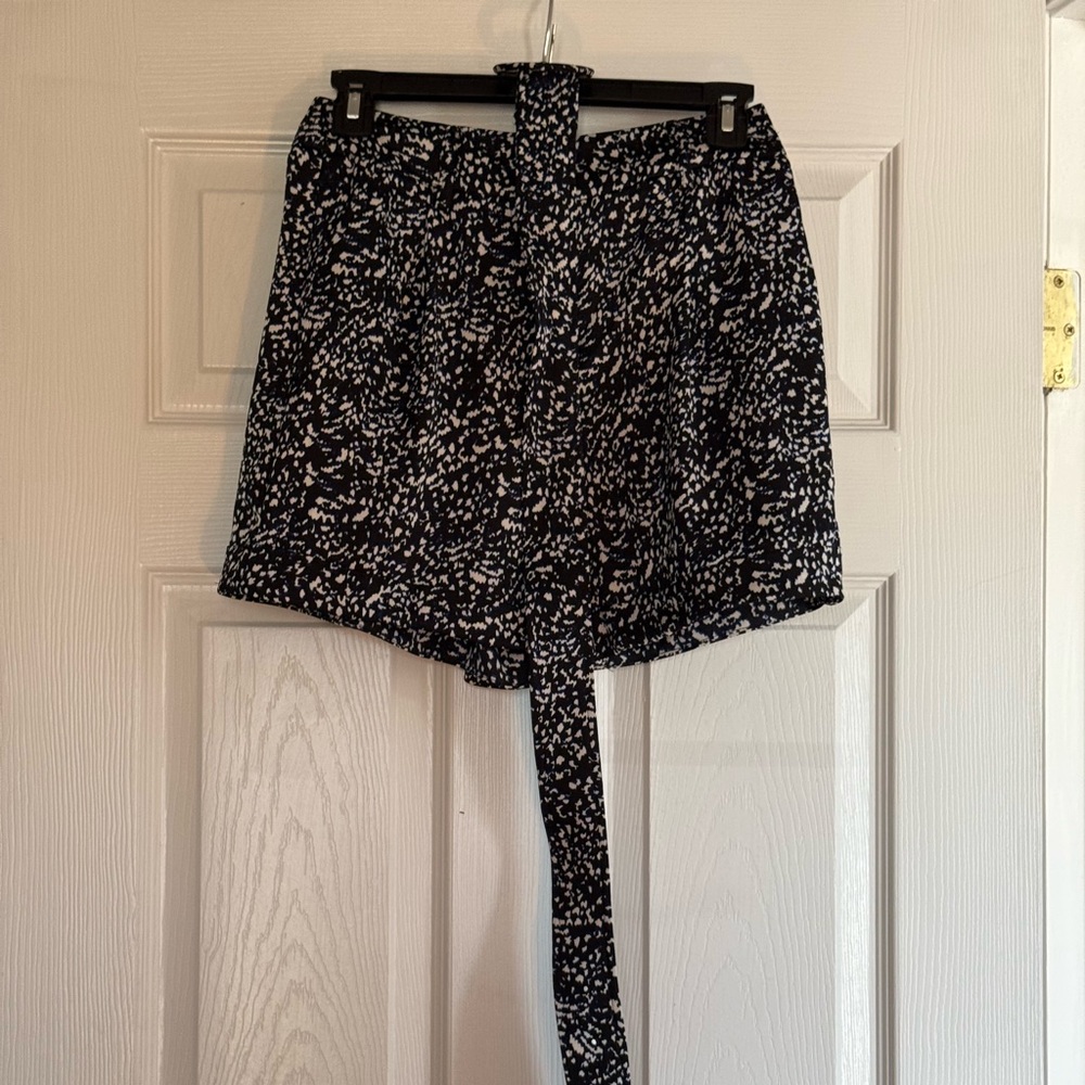 Silk dress shorts with matching belt. Wore twice maybe three times.